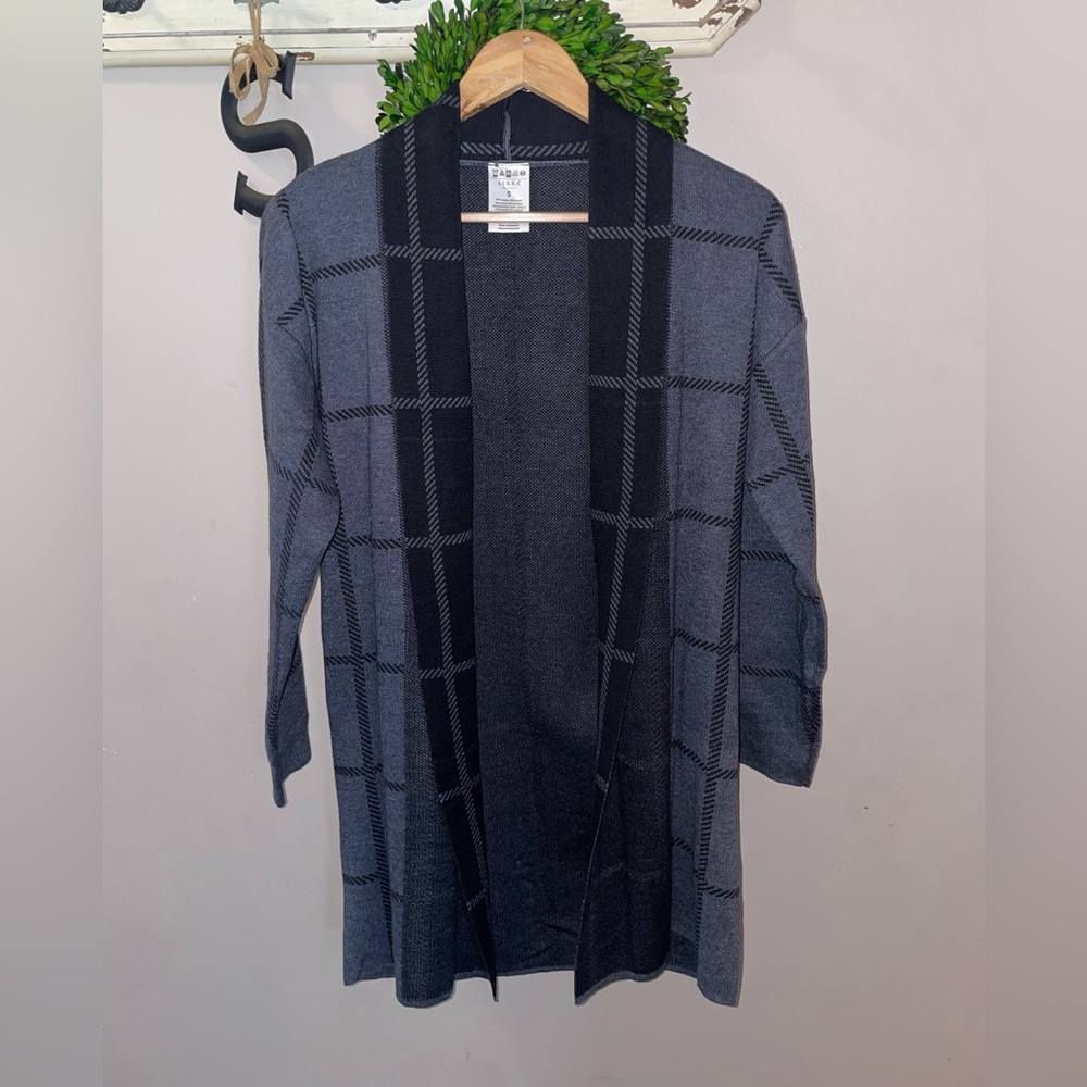 Woman’s Sweater - Never Worn 
Black Size Small $9